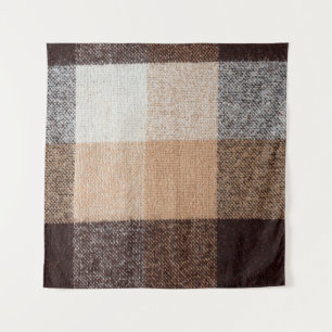 Brown chequered wool plaid fabric texture. tartan tapestry