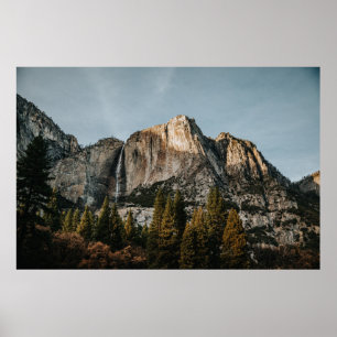 BROWN CLIFF NEAR TREES UNDER BLUE SKY POSTER