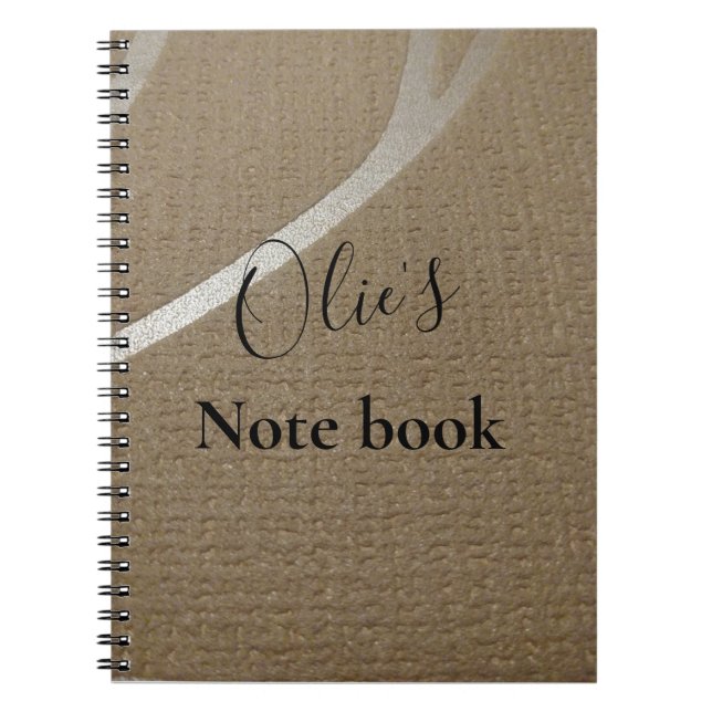 Brown colour spiral notebook with a textured look. (Front)