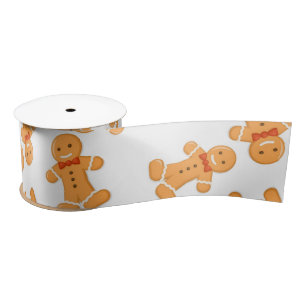 Brown gingerbread man on white satin ribbon