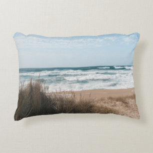 BROWN GRASS NEAR SEA UNDER BLUE SKY DECORATIVE CUSHION