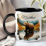 Brown Grizzly Bear Lake Mountain Reflection Mug<br><div class="desc">Enjoy your favourite beverage with the Brown Grizzly Bear Lake Mountain Reflection Mug. This unique mug features a stunning design of a grizzly bear by a serene mountain lake, with the majestic scenery beautifully reflected in the water. Customised with your name, it adds a special touch that makes it uniquely...</div>
