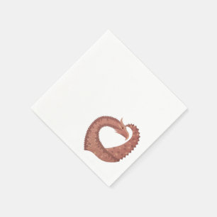 Brown heart dragon on white napkin