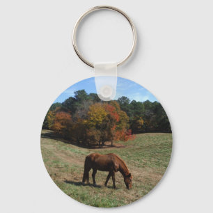 Brown horse with fall trees key ring
