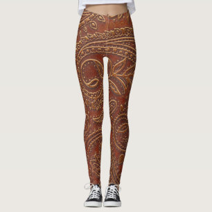 Brown leather, tooled floral pattern. leggings