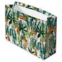 Brown leopard in tropical lush jungle leaves wrapp