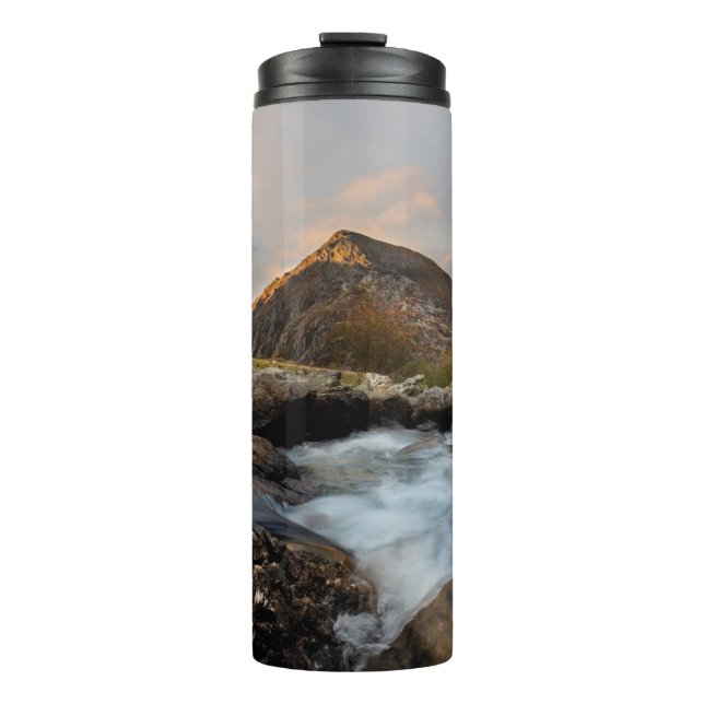 BROWN MOUNTAIN NEAR BODY OF WATER UNDER CLOUDY SKY THERMAL TUMBLER (Front)