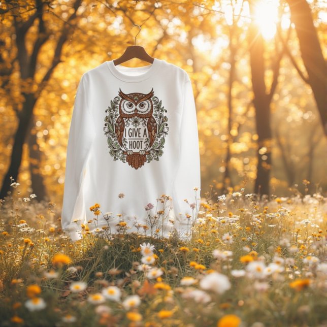Brown owl with flowers design T-Shirt (Brown owl with flowers design T-Shirt
A wise brown owl with a delicate flower design and the sentime)
