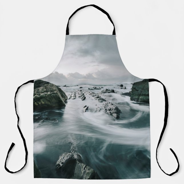 BROWN ROCK AND CLIFF SURROUNDED BODY OF WATER APRON (Front)