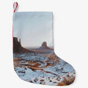 BROWN ROCK FORMATION ON WHITE SNOW COVERED GROUND  SMALL CHRISTMAS STOCKING