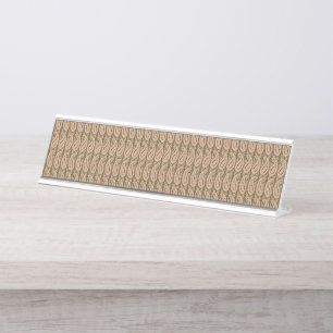 Brown rug featuring a detailed motif pattern with  desk name plate