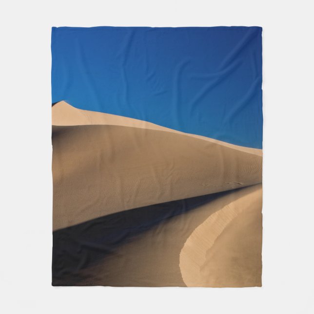 BROWN SAND UNDER BLUE SKY DURING DAYTIME FLEECE BLANKET (Front)