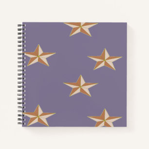 brown stars on purple notebook