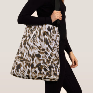 Brown twisting holes in motion, dark and whitish crossbody bag