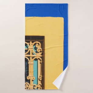 BROWN WOODEN DOOR WITH BRASS DOOR LEVER BATH TOWEL