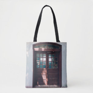 BROWN WOODEN WINDOW ON BLUE CONCRETE WALL TOTE BAG