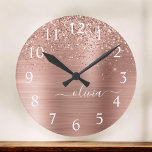 Brushed Metal Rose Gold Pink Glitter Monogram<br><div class="desc">Rose Gold - Blush Pink Faux Foil Metallic Sparkle Glitter Brushed Metal Monogram Name Clock. This makes the perfect sweet 16 birthday,  wedding,  bridal shower,  anniversary,  baby shower or bachelorette party gift for someone that loves glam luxury and chic styles.</div>