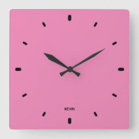 Bubble gum pink clock face and black hours numbers
