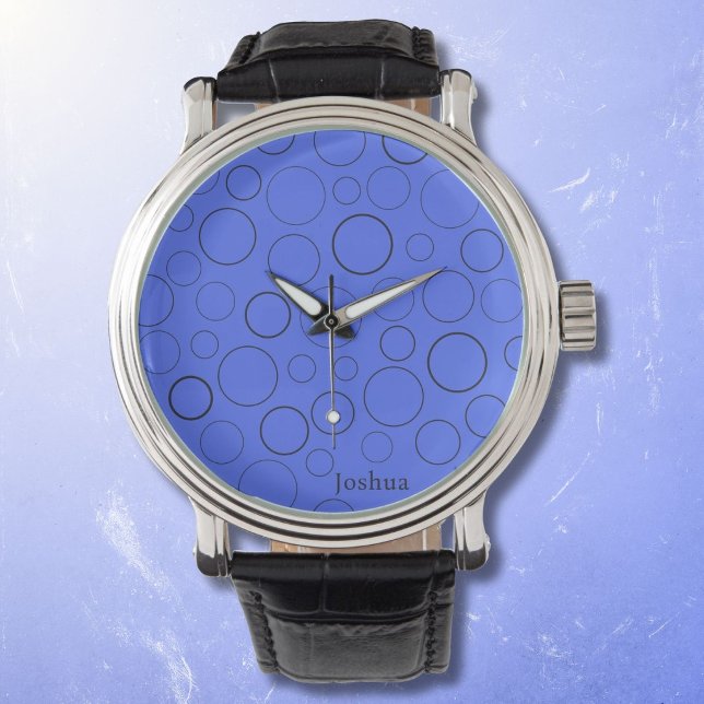 Bubbles and rings, black circles on blue watch (Creator Uploaded)