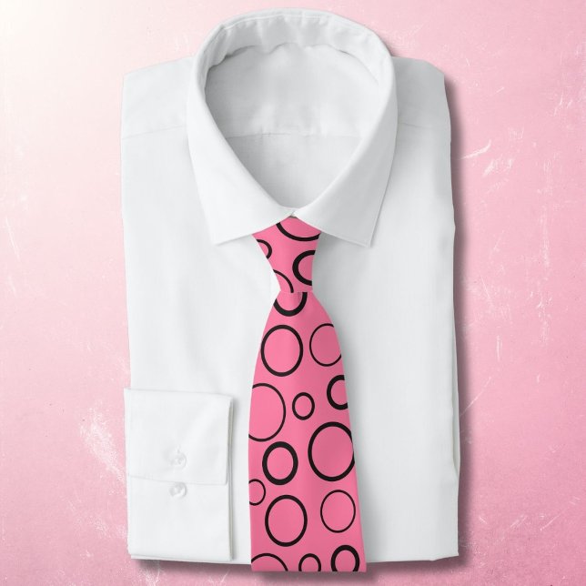 Bubbles and rings, black circles on pink tie (Creator Uploaded)