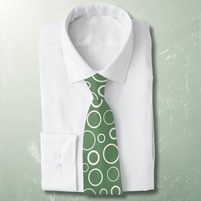 Bubbles and rings, white circles on green tie (Creator Uploaded)