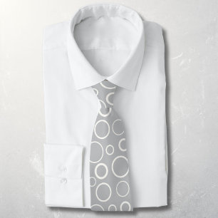 Bubbles and rings, white circles on grey tie
