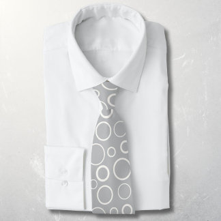 Bubbles and rings, white circles on grey tie