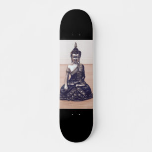 Buddha Metallic Statue on Wooden Floor Skateboard