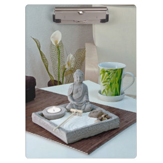 Buddha Statue in Zen Rock Garden Clipboard