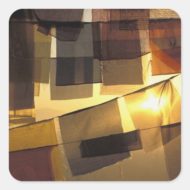Buddhist prayer flags in the sunset, square sticker (Front)