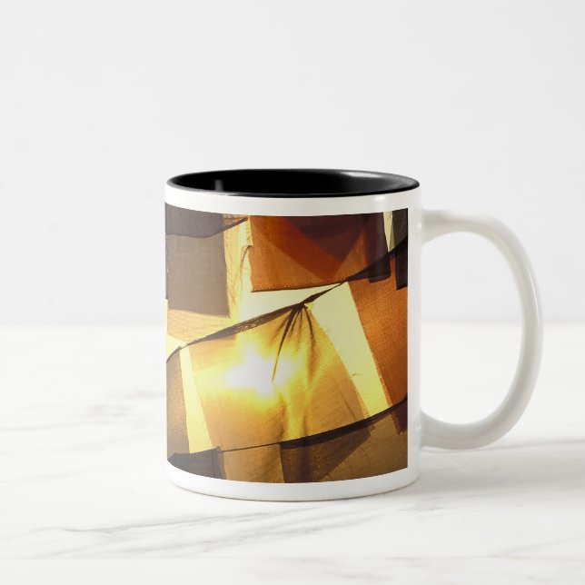 Buddhist prayer flags in the sunset, Two-Tone coffee mug (Right)