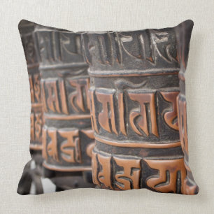 Buddhist prayer wheels throw pillow