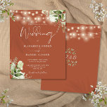 Budget Floral Lights Terracotta Wedding Invitation<br><div class="desc">This elegant terracotta wedding invitation,  featuring pretty string lights and floral greenery,  can be personalised with your information in chic typography with your monogram initials on the reverse. Designed by Thisisnotme©</div>