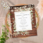 Budget Rustic String Lights Bridal Shower Invite<br><div class="desc">Featuring delicate watercolor greenery leaves and pretty string lights on a rustic wood background,  this chic budget bridal shower invitation can be personalised with your special bridal shower information. Designed by Thisisnotme©</div>