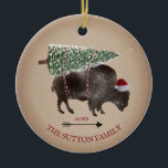 Buffalo Bison Santa Arrow Snow Christmas Tree Ceramic Tree Decoration<br><div class="desc">Illustration of a buffalo wearing a santa hat with a snow covered Christmas tree tied to its back.  Snow speckle and cardstock inspired background with arrow design.</div>