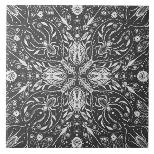 Bugs, off white on black tile