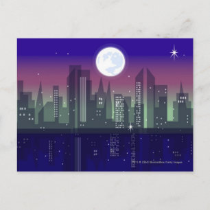 Buildings lit up at night postcard