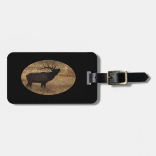 Bull elk bugling in silhouette luggage tag