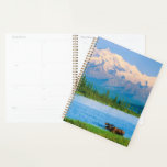 Bull moose in Wonder Lake Planner<br><div class="desc">Wonder Lake,  Bull moose feeds on vegetation,  Alaska mountains in the distance,  Denali National Park,  Alaska</div>