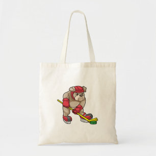 Bulldog at Ice hockey with Hockey stick Tote Bag