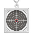 Bullet hole in the target - bull's eye shooting