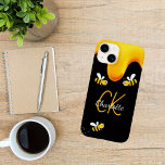 Bumble bees black honey dripping monogram Case-Mate iPhone 14 case<br><div class="desc">A stylish black background and happy smiling bumble bees. Decorated with sweet,  golden honey dripping. Personalise and add your name and monogram initials,  golden and white letters.  The name is written with a hand lettered style script.</div>