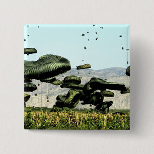 Bundles of food and water are air delivered 15 cm square badge
