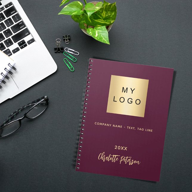 Burgundy business logo name script elegant notebook (Creator Uploaded)