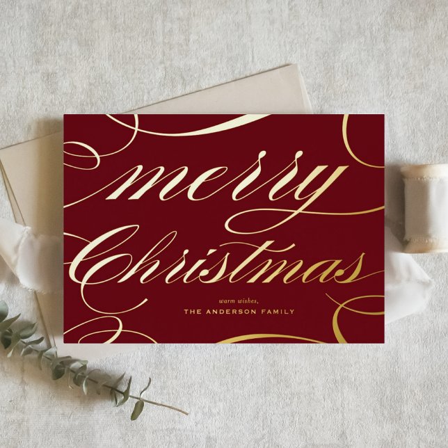 Burgundy Elegant Flourish Script Merry Christmas (This burgundy Merry Christmas card features a beautiful flourish script in gold foil.)