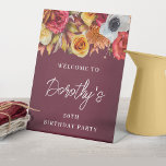 Burgundy Fall Flowers 50th Birthday Party Welcome Pedestal Sign<br><div class="desc">Welcome your guests in style with this fall welcome sign. A lush border of fall flowers is placed across the top and it pops against the burgundy watercolor background. Three lines of bright white text let you customise your birthday party welcome. This item is part of the Burgundy Fall Flowers...</div>