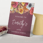 Burgundy Fall Flowers 90th Birthday Party Welcome Pedestal Sign<br><div class="desc">Welcome your guests in style with this fall welcome sign. A lush border of fall flowers is placed across the top and it pops against the burgundy watercolor background. Three lines of bright white text let you customise your birthday party welcome. This item is part of the Burgundy Fall Flowers...</div>