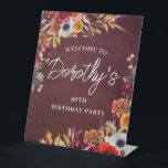 Burgundy Fall Flowers 90th Birthday Party Welcome Pedestal Sign<br><div class="desc">Beautiful fall flowers decorate two corners of this birthday party welcome sign. Red roses,  terracotta flowers and white peonies blend with deep green leaves and foliage. The flowers and white modern script pop against the burgundy red background. This item is part of the Burgundy Fall Flowers collection.</div>