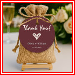 Burgundy & Ivory Elegant Wedding Thank You Classic Round Sticker<br><div class="desc">Seal your stationery with sophistication using this Burgundy & Ivory Elegant Wedding Thank You Sticker. Featuring a rich wine-red border and a clean ivory center, this classic round label offers a polished, high-end look for your thank you notes and favor packaging. Perfect for formal ceremonies, black-tie receptions, or vineyard weddings,...</div>