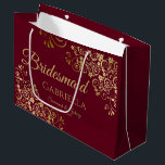 Burgundy Maroon & Gold Lace Elegant Bridesmaid Large Gift Bag<br><div class="desc">This beautiful gift bag is designed as a wedding gift or favour bag for Bridesmaids. It features an elegant burgundy, maroon, or wine red and gold design with golden lace frills in the corners the text "Bridesmaid" as well as a place to enter her name, the couple's name, and the...</div>